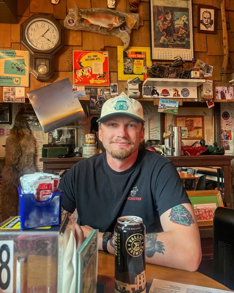 Justin sitting at our table in the Last Chance Saloon.