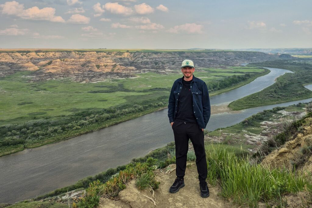 Justin in front of the Orkney Viewpoint. You can see the Red Deer River below and Horsethief Canyon on the other side of the river.