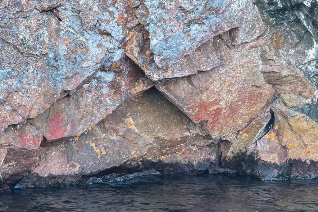 A broken piece of Mazinaw Rock with remnants of pictographs